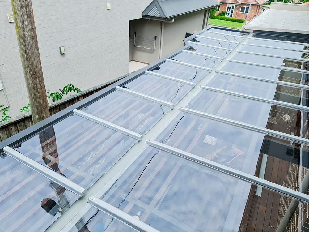 Flat Roof Awning with Palram Sunglaze Solid Clear Polycarbonate Roofing at Lane Cove Top View 2