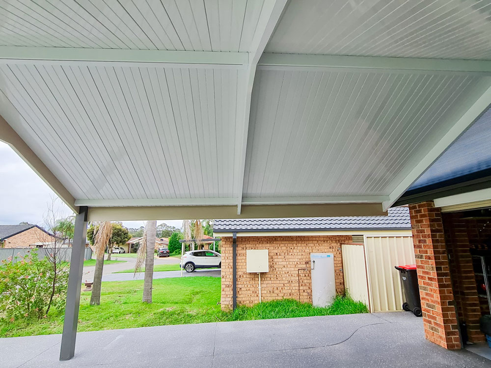 Gable Single Skin Colorbond Carport with Shademaster Flat Profile Roofing Featuring Welded Trusses at St.Clair