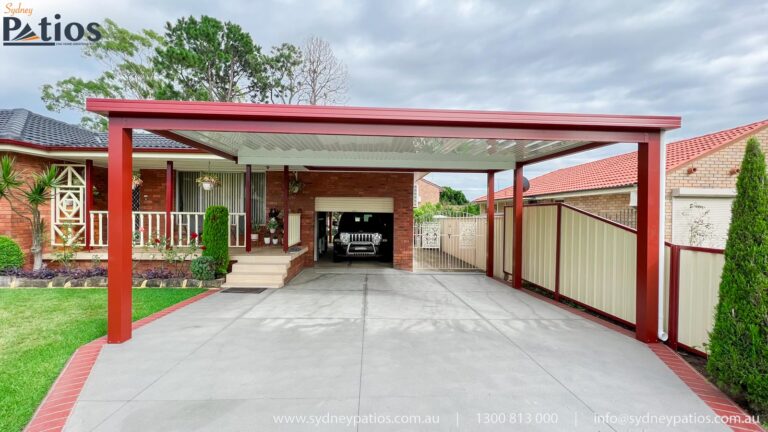 Sydney Patios' double carport in Manor Red, front view, attached to an Ingleburn residence.